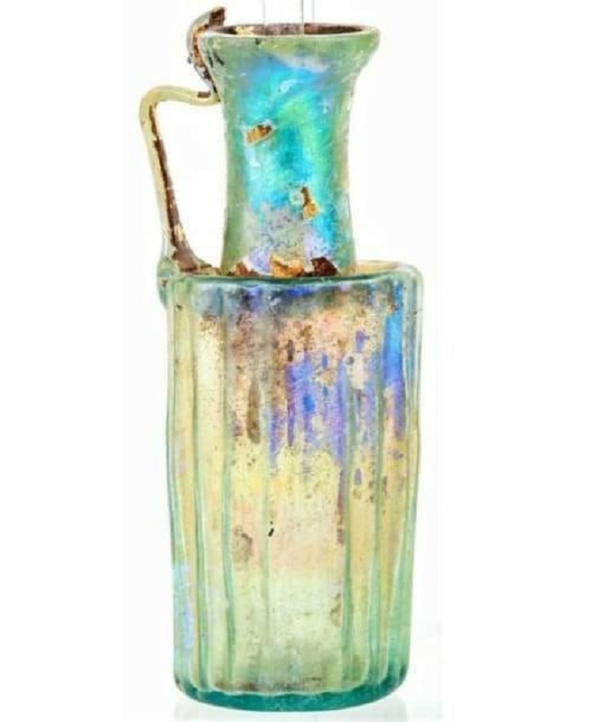 Unveiling the Timeless Beauty of a Roman Glass Jug: A Colorful Window into the Past