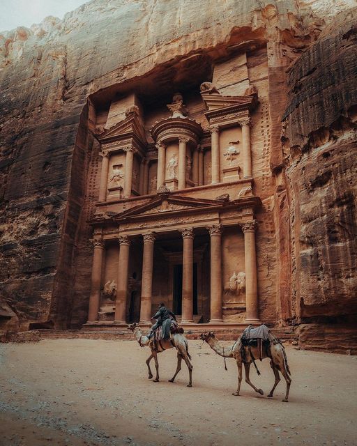 The treasury of Petra, Al-Khazneh - an ancient tomb carved directly into sandstone 