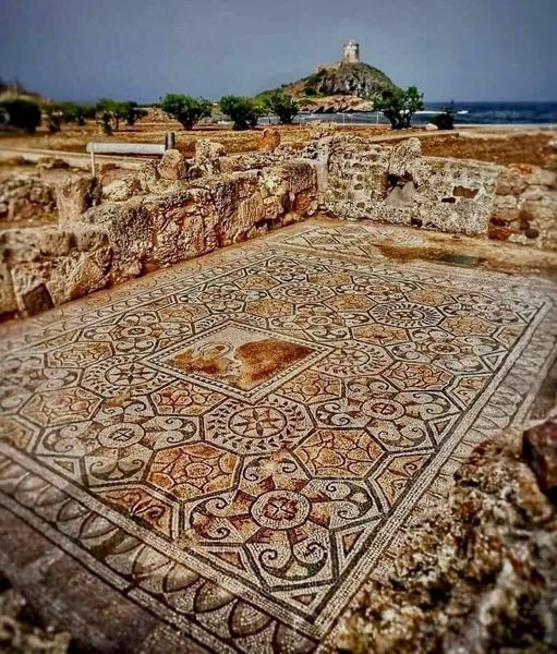 Roman Mosaic Floor (2nd Century AD), at the House of the Tetrastyle in located inside Pula Archaeological Park, Nora, Sardinia, Italy.