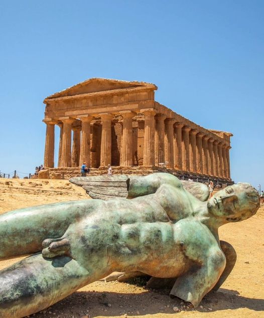Exploring the Timeless Beauty of Sicily's Temple of Concordia and the Mythical Icarus Sculpture